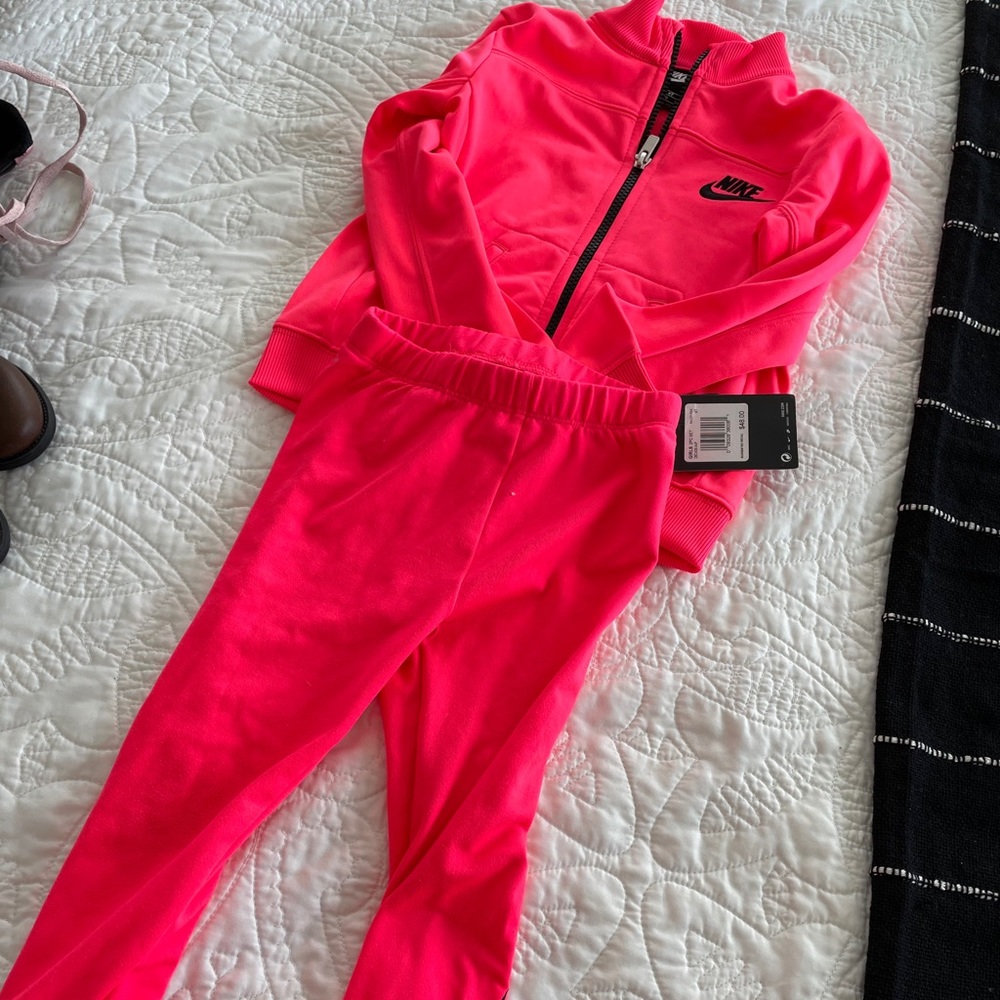NWT Nike jacket and matching pants that are used